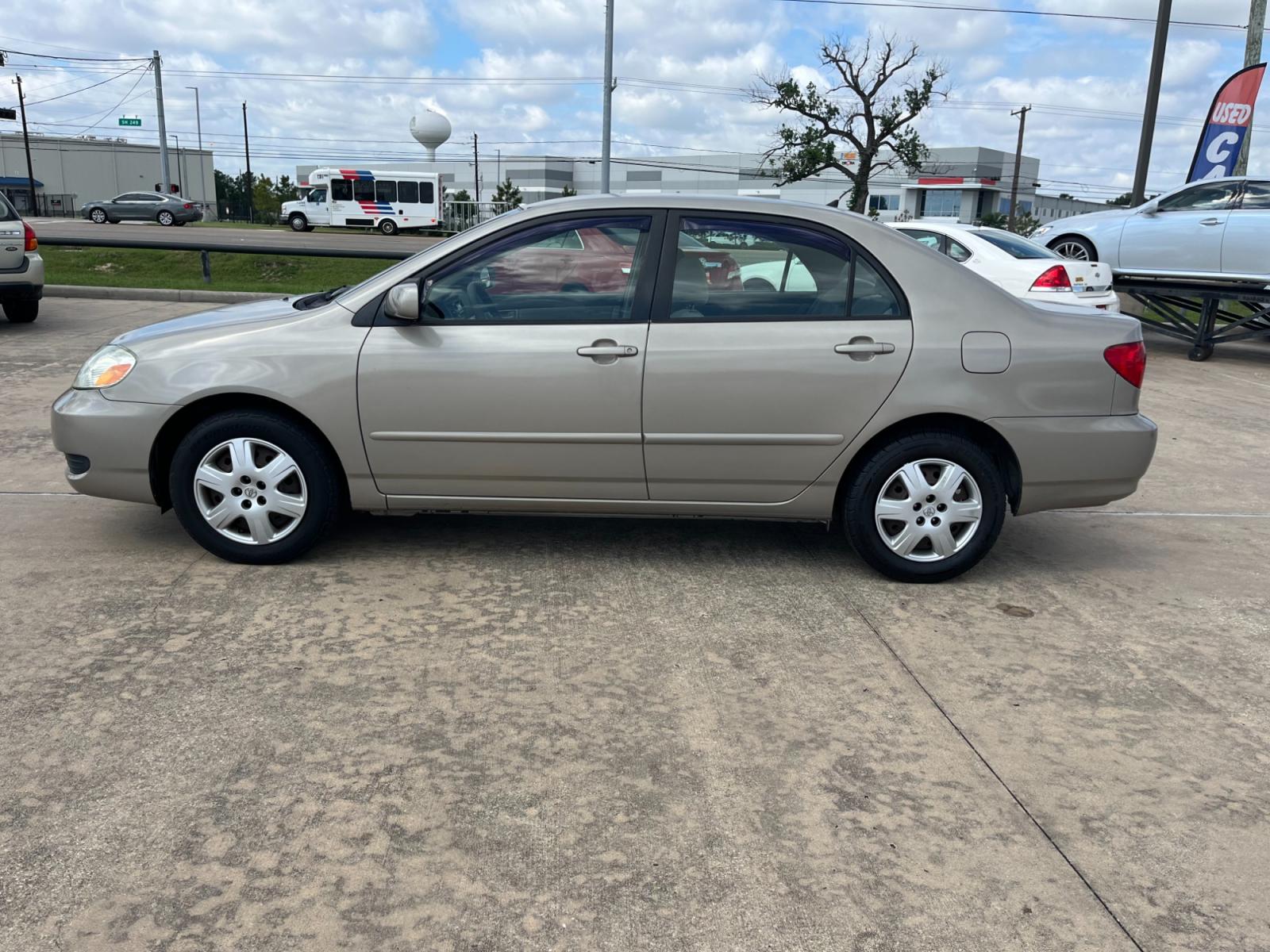 2005 GOLD /TAN Toyota Corolla CE (1NXBR32E75Z) with an 1.8L L4 DOHC 16V engine, Automatic transmission, located at 14700 Tomball Parkway 249, Houston, TX, 77086, (281) 444-2200, 29.928619, -95.504074 - Photo #3